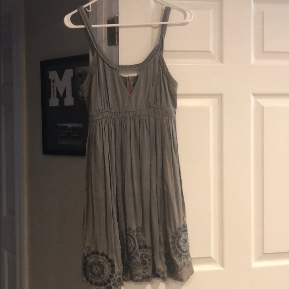 Grey dress. Beautiful embroidery on the bottom